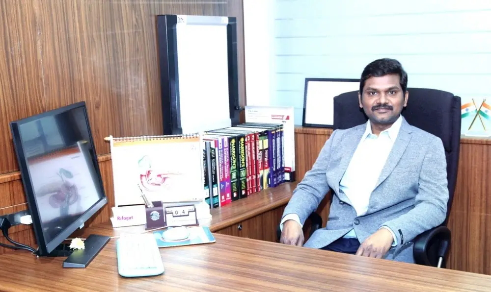 Dr Sudheer Moodadla at his desk in the consulting room in Secunderabad